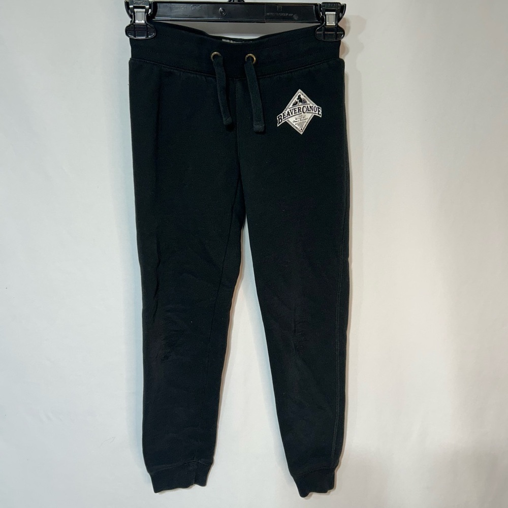 Beaver Canoe ROOTS girls black jogging shorts. Size medium. Drawstring waist.